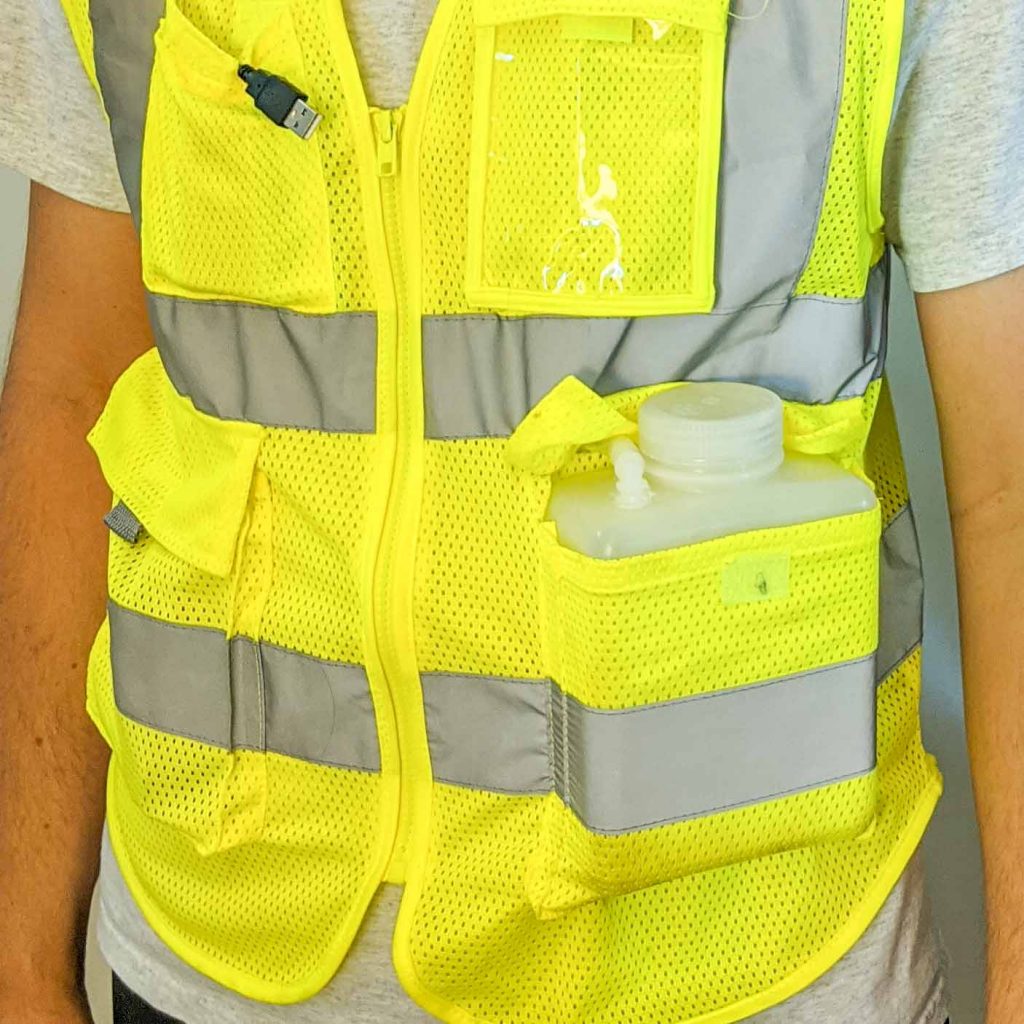 yellow safety vest with Nalgene bottle